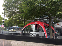 
	フランクフルトショー会場のエントランス脇、レストランの前に設営された三菱自動車のテント。
	