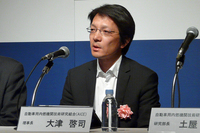 質疑応答にのぞむAICE理事長の大津啓司氏（本田技術研究所 常務執行役員）。
    