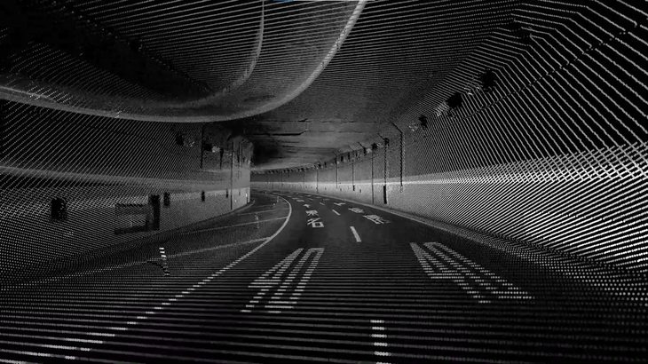 HDマップの製作に際しては、まずは計測器を搭載した車両で対象となる道路を走行し、写真のような高精度3次元点群データを生成。そこから必要となる情報を抽出する。