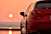 能登半島の七尾湾の夕日とともに。